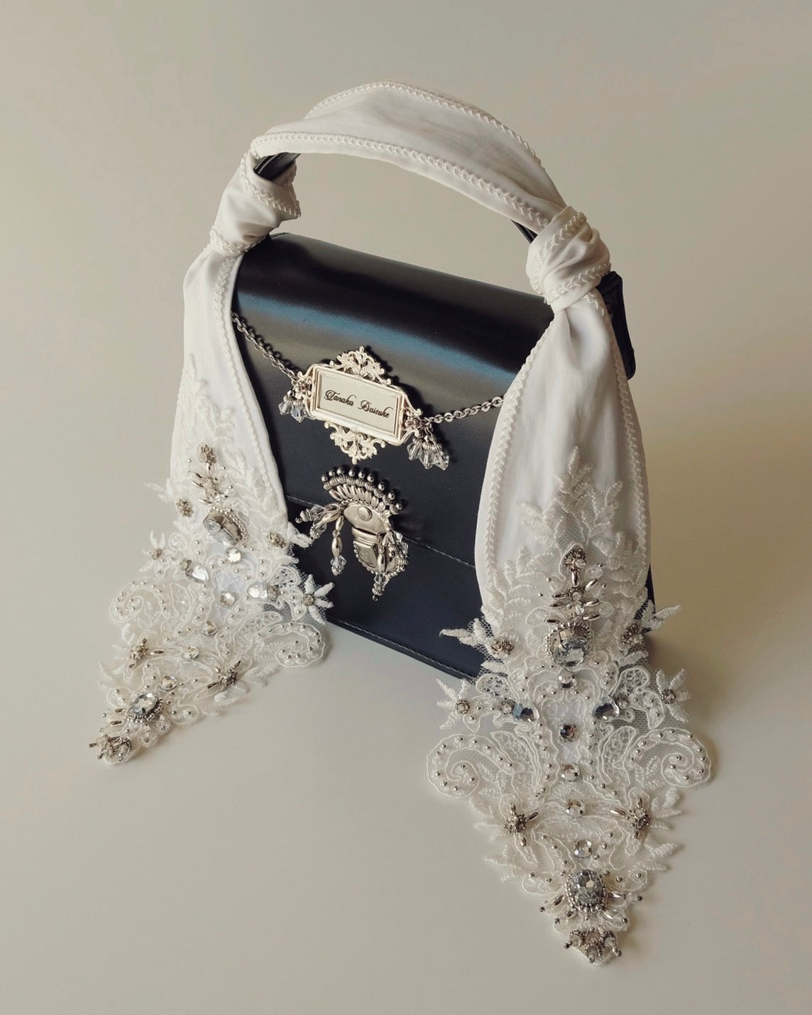 tanakadaisuke(タナカダイスケ)|バッグ|silver tag mini hand bag