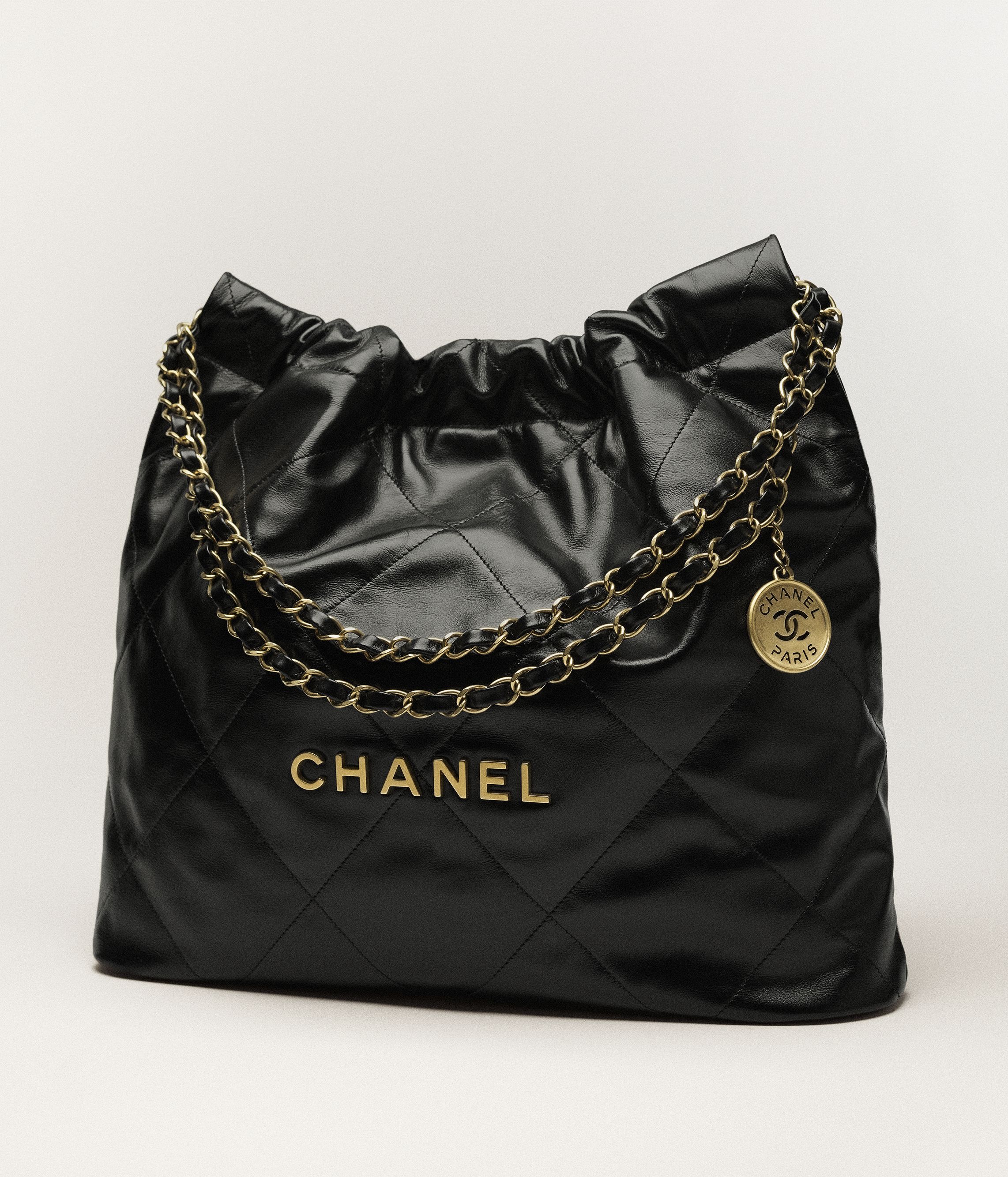 Chanel 22 handbag, Shiny calfskin & gold-tone metal , black