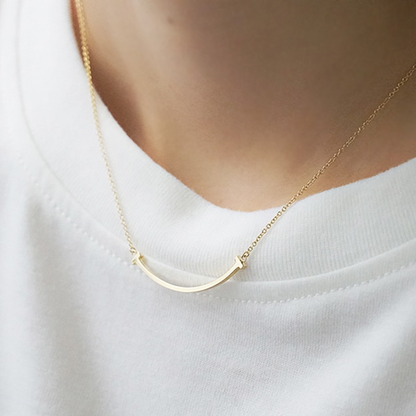 生涯楽しめるマストジュエリー！Tスマイルペンダント ネックレス