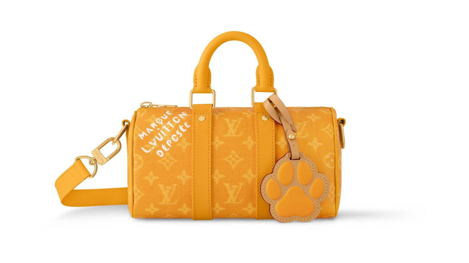 ルイ・ヴィトン“犬の肉球”チャーム付きメンズバッグ、鮮やかなイエロー