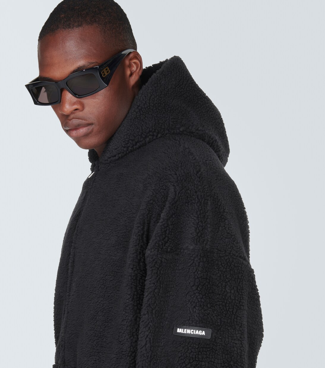 Oversized fleece hoodie in black - Balenciaga | Mytheresa