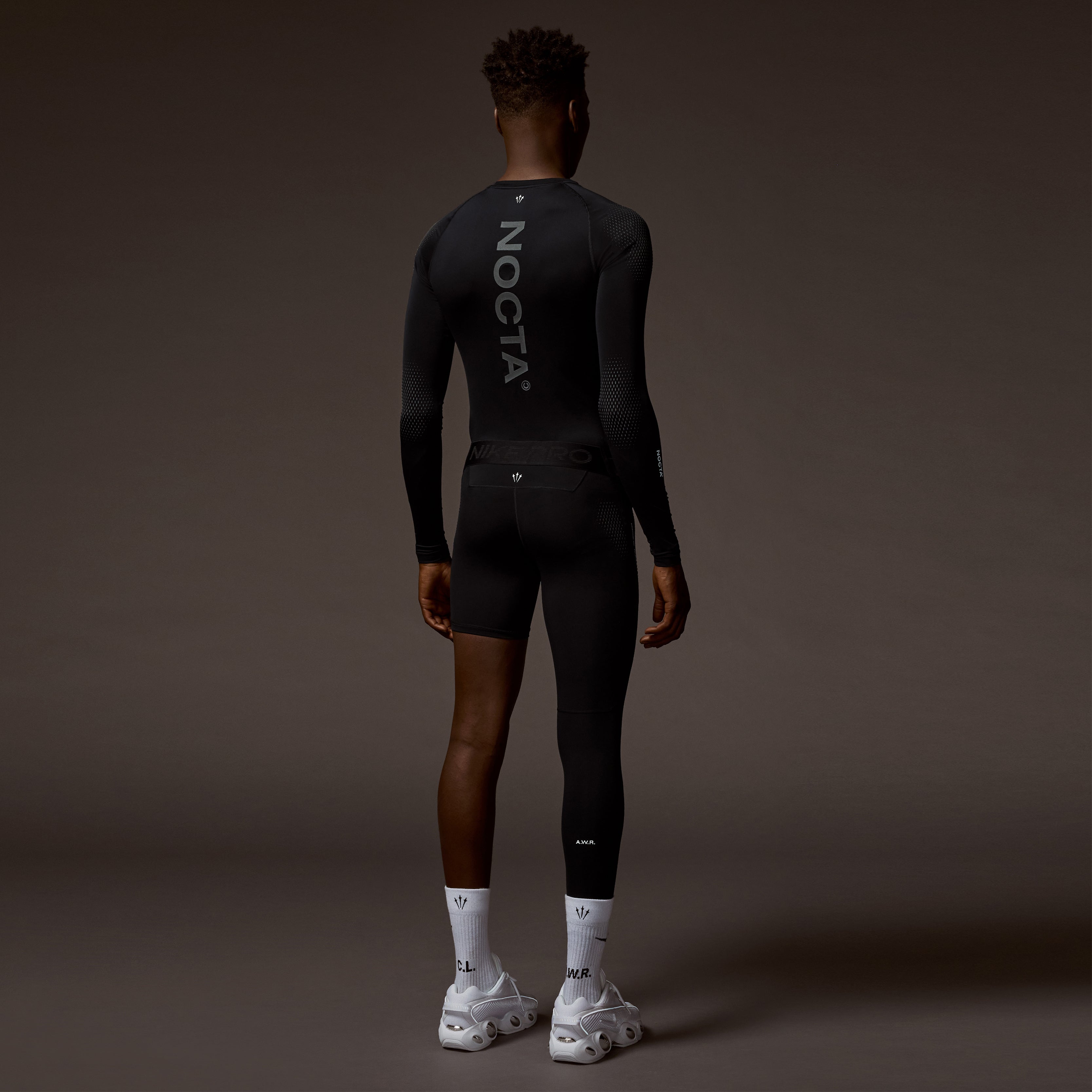 Black (Right) Single Leg Tights in Black | NOCTA