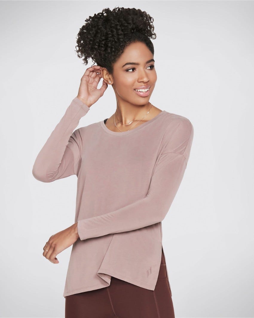 Shop Skechers Tranquil Long Sleeve Top in Pink.