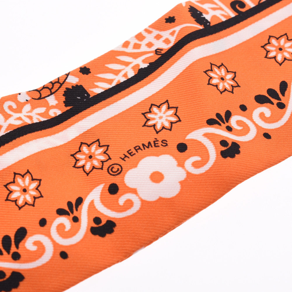 エルメスツイリー 風の民/Peuple du Vent オレンジ/黒/白 レディース