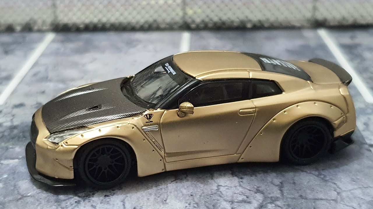 MINI GT LB-WORKS Nissan GT-R (R35) Satin Gold w/ Carbon Type 1