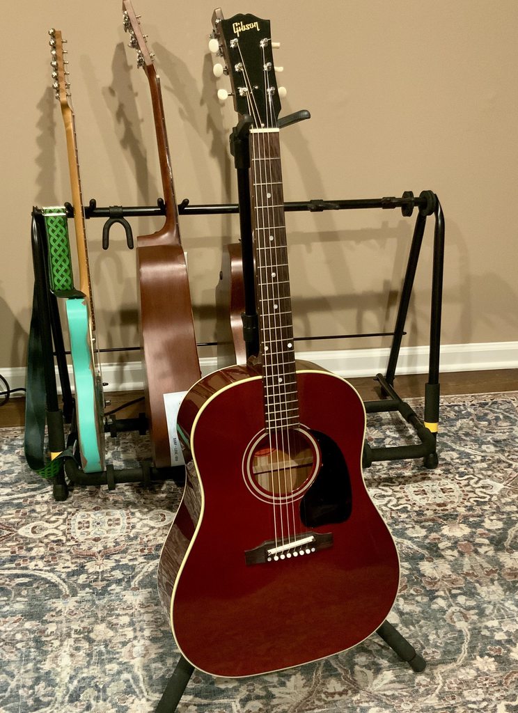 Gibson j-45 60s reissue (ebony and wine red models). Experience