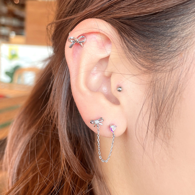 16G ］華奢リボン とオーロラビジュー がフェミニンな印象に。チェーン