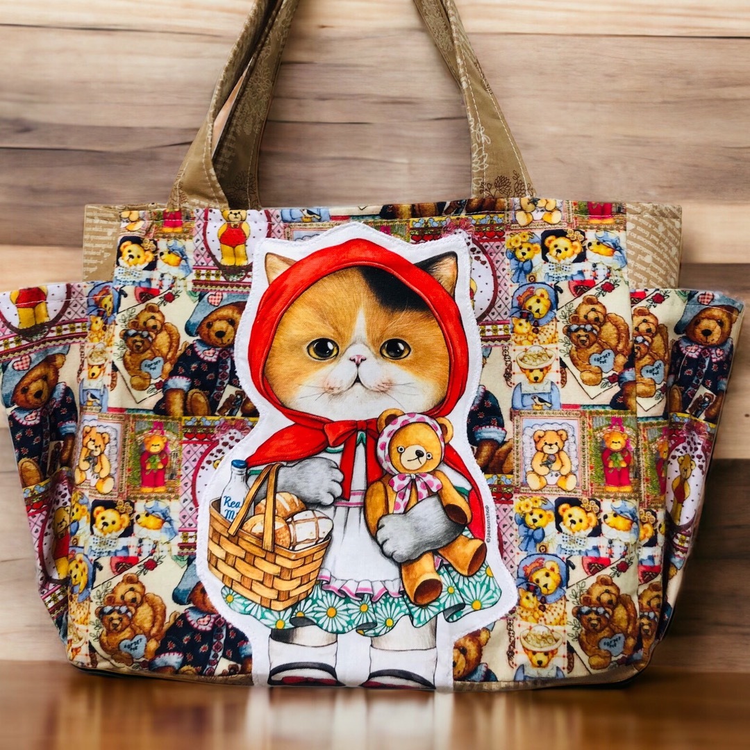 コヤンイサムチョン リボン柄ダブルフリルコロリンバッグ コヤンイサム