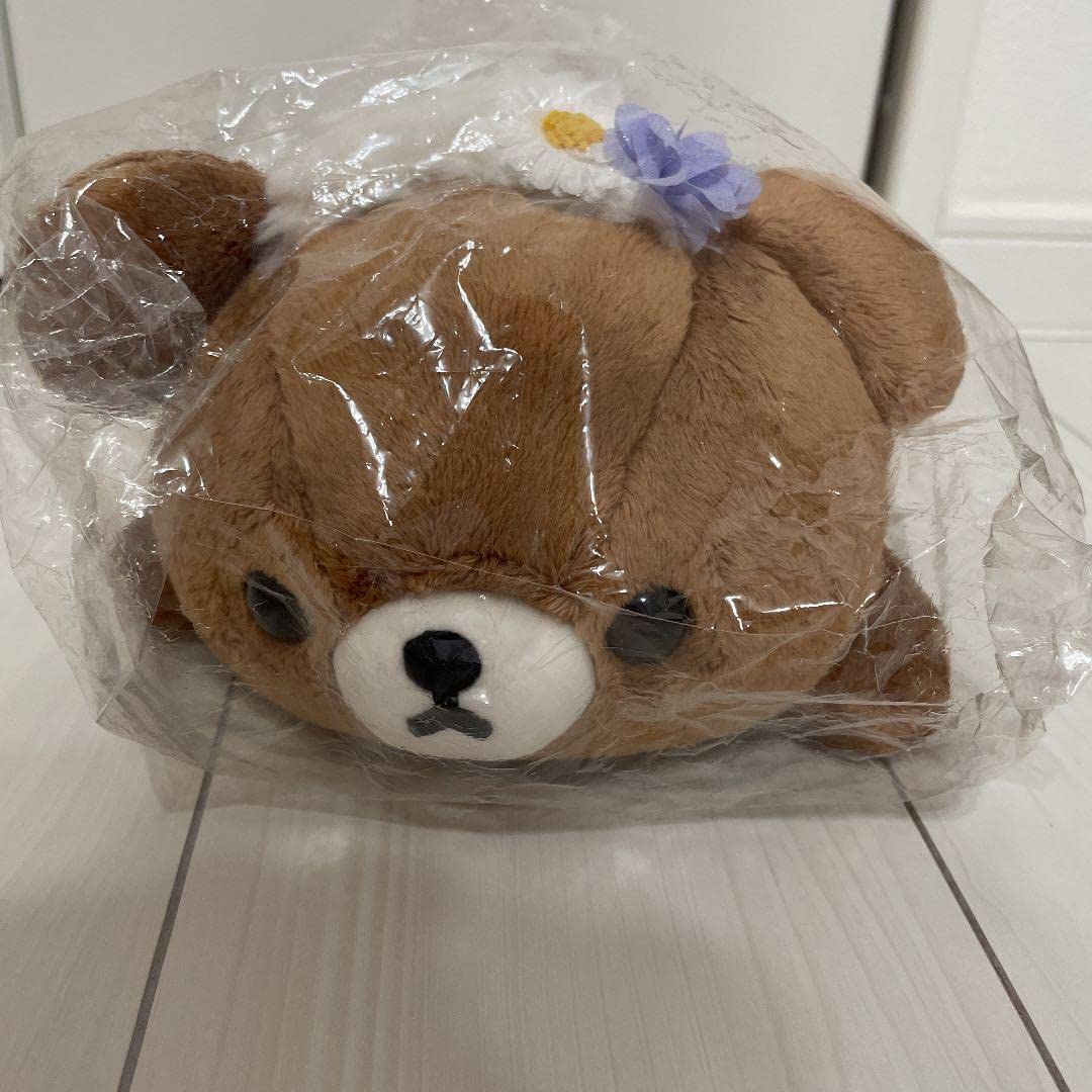 Amazon.co.jp: チャイロイコグマのくたくた抱きぐるみ お花畑の小さな