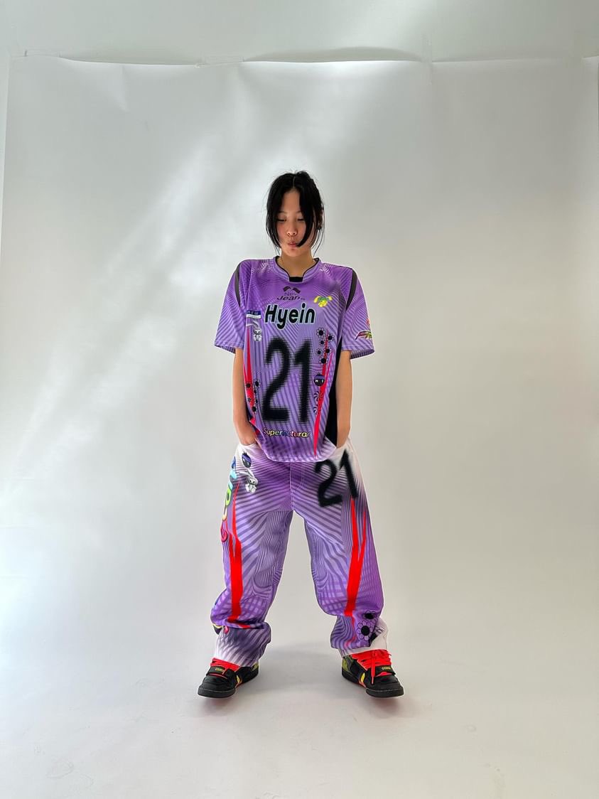 NewJeans' custom Paolina Russo t-shirts