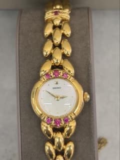 SEIKO セイコー レディース腕時計 1E20-0770 ゴールド ルビー装飾