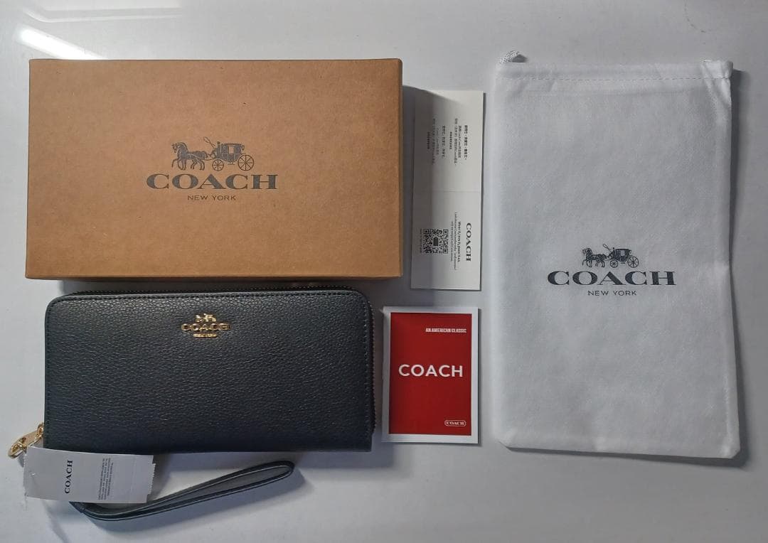 新品 未使用 COACH コーチ ラウンドジップ長財布 あんしん鑑定利用可能