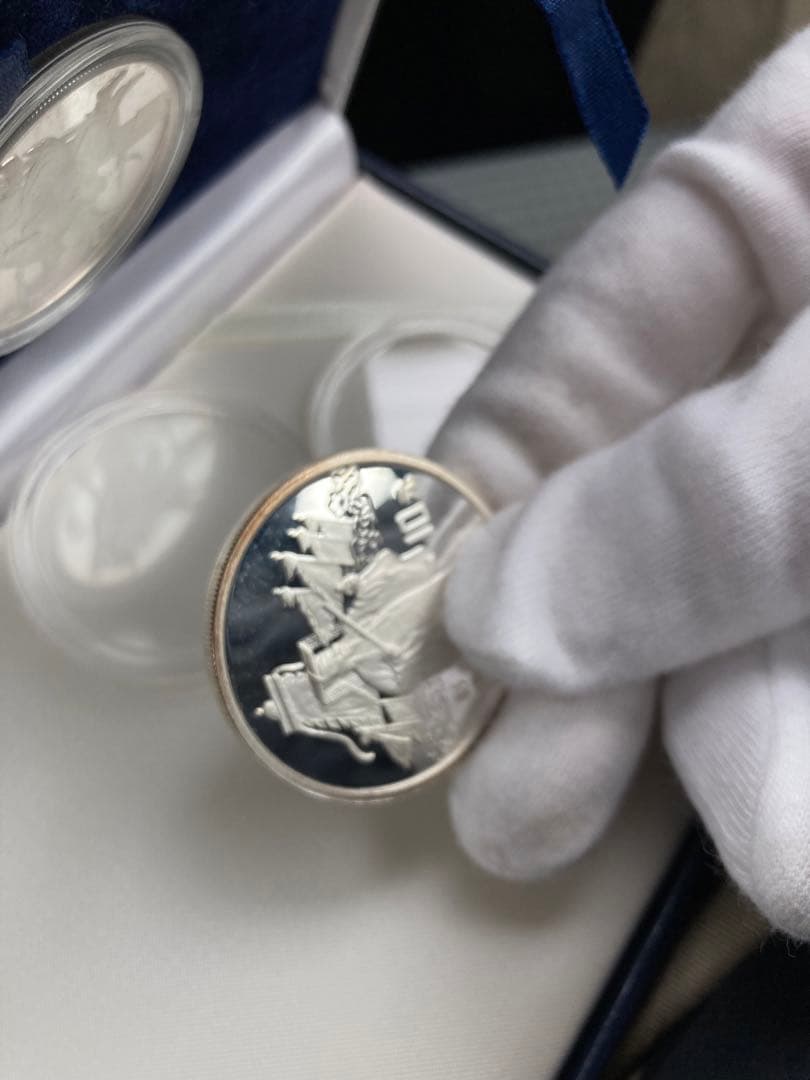 三国志 記念硬貨4枚セット 1995年 鑑定書ナンバー付き - メルカリ