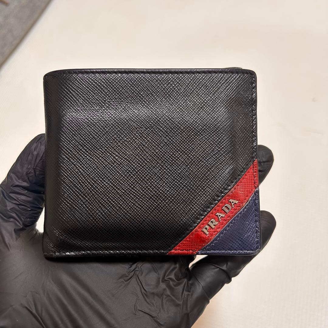 ノ*リ様 PRADA 二つ折り財布 黒/赤/青 美品 PRADA プラダ 二つ折り財布 ミニ財布 バイカラー 赤×黒｜Yahoo