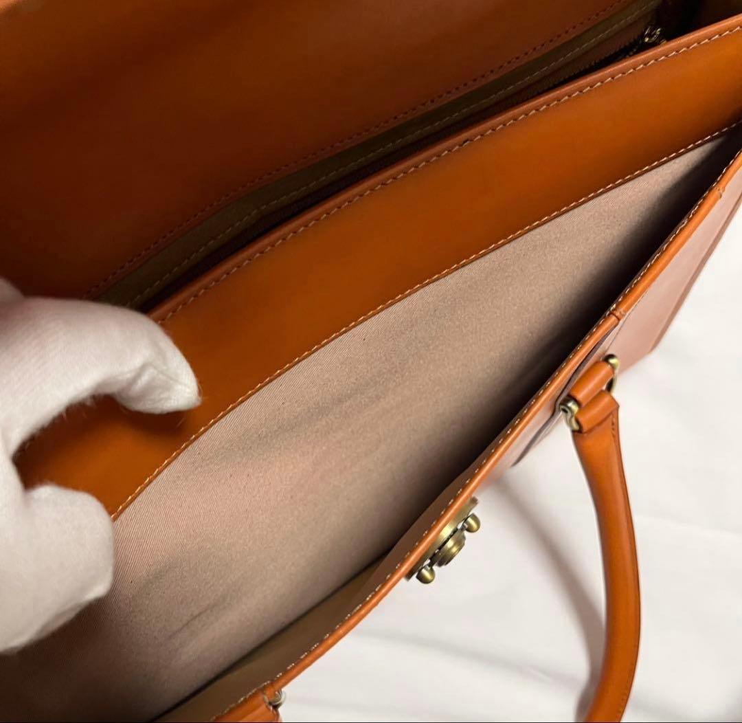 【12/31迄】《最終価格》タケオキクチ　ブリーフケース　ラップフラップダレス