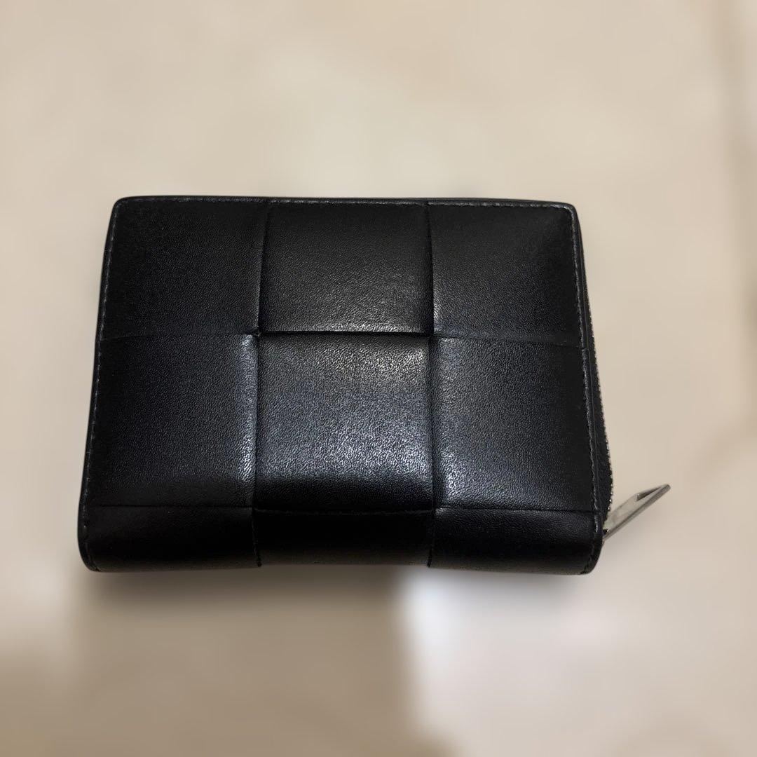 BOTTEGA VENETA カセット財布　ジップアラウンドウォレット カセット ジップアラウンドウォレット のために メンズ で ブラック