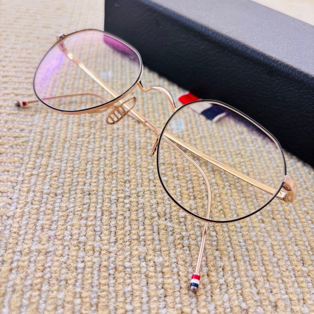 THOM BROWNE TBX914-48-02(TB-914) GLD-BLK - メルカリ