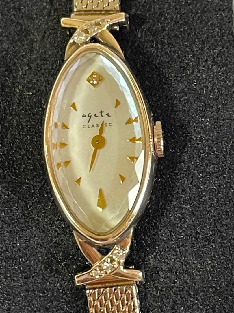 agete アガット オーバルフェイス ジュエリーウォッチ ダイヤ シェル