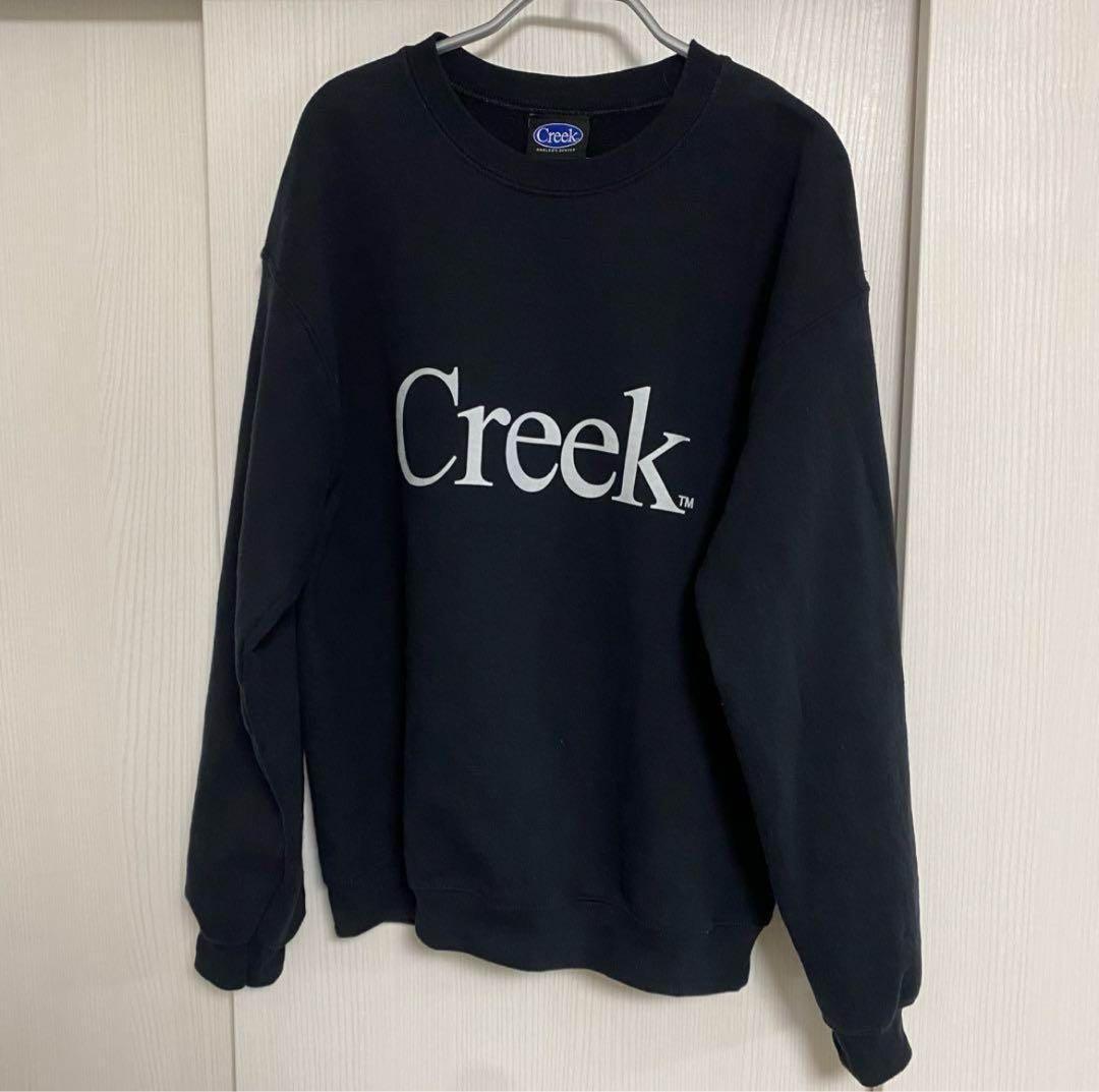 Creek ブラック トレーナー Creek Anglers Device（クリーク アングラーズデバイス） ロゴプリント