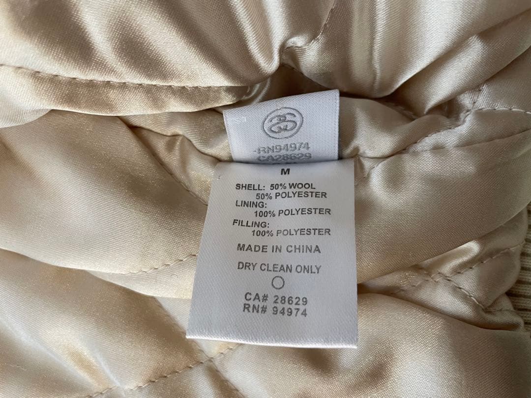 Stussyステューシー スタジャン リブライン オフホワイト 両面ロゴ刺繍 M