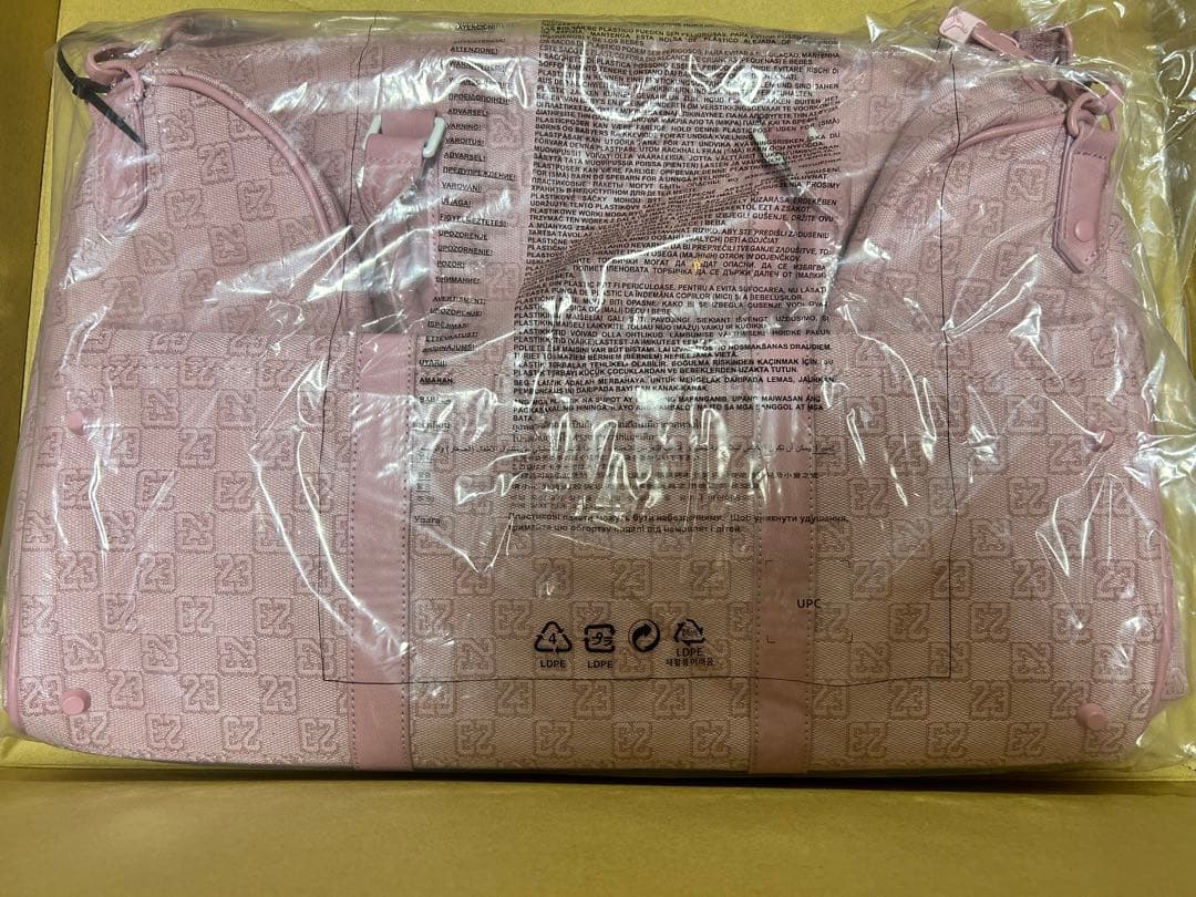 NIKE エアジョーダン モノグラム ダッフルバッグ ピンク - メルカリ