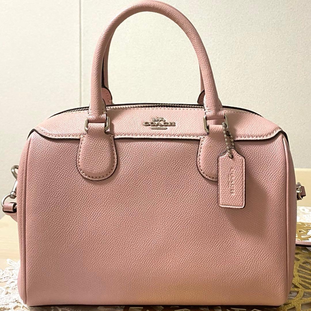 COACH ピンク ミニボストン バッグ - メルカリ
