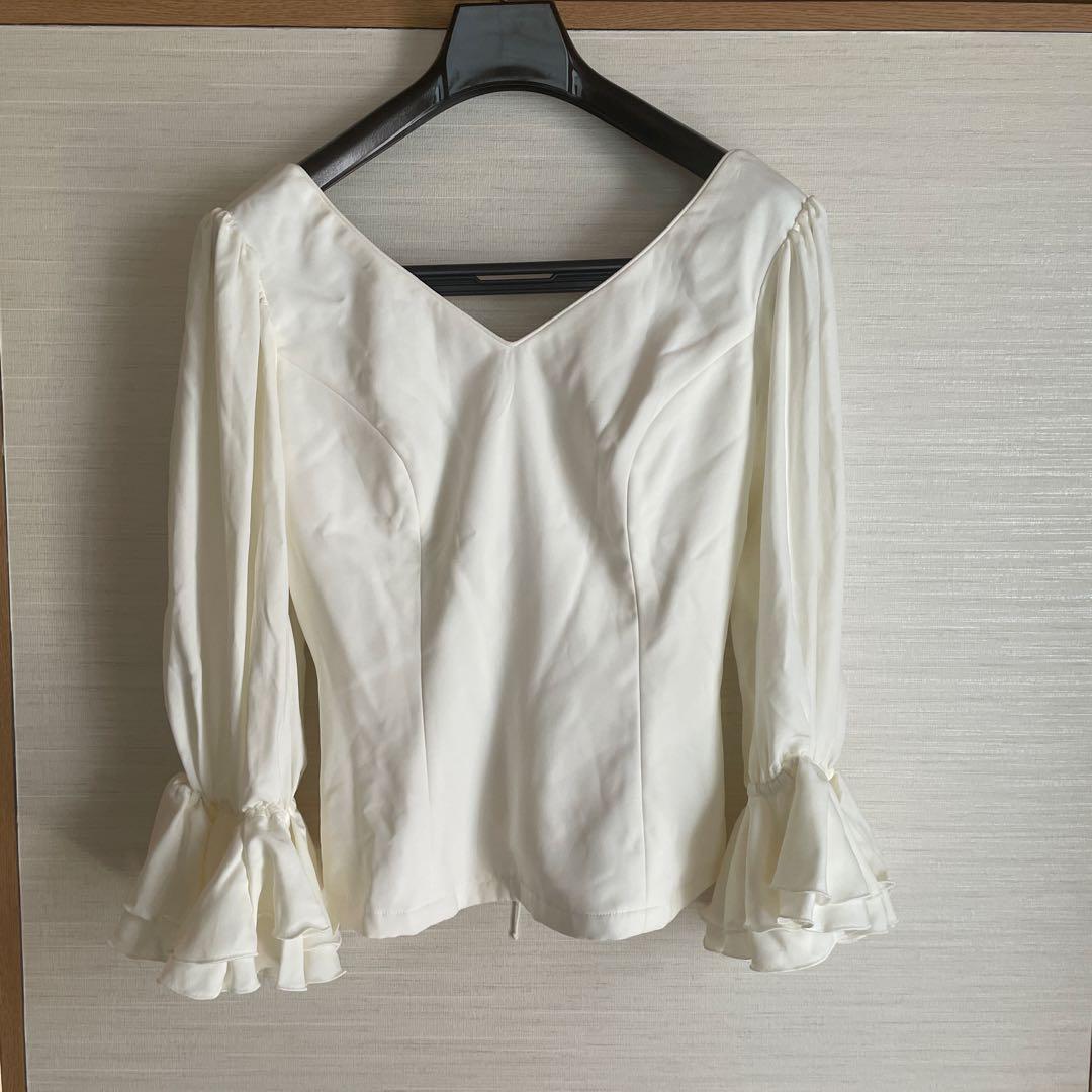ソニアジョーンズ オフホワイトブラウス - メルカリ