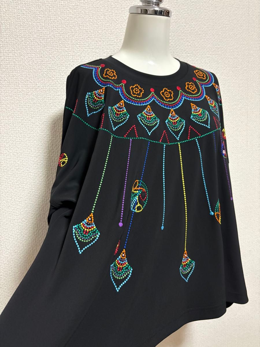 トクコプルミエブォル/カラフル幾何学模様の長袖Aラインチュニック(訳