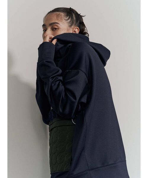 UN3D.（アンスリード）の「サークルキルティングポケットフーディ