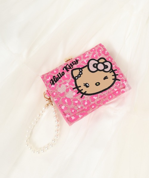 日焼けｷﾃｨｸﾞﾘｯﾀｰﾋｮｳ柄口金ﾐﾆ財布（財布）｜sanrio（サンリオ）の