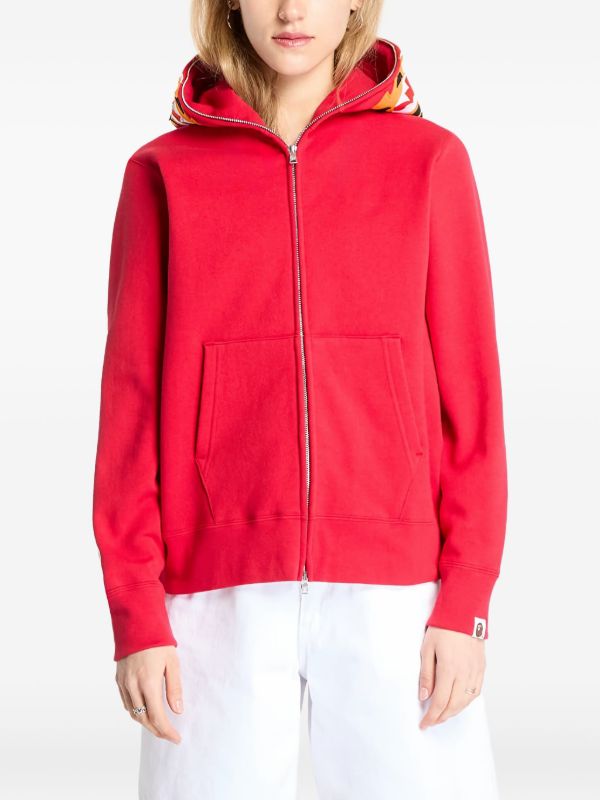 A BATHING APE® タイガー ジップアップパーカー | レッド | FARFETCH JP
