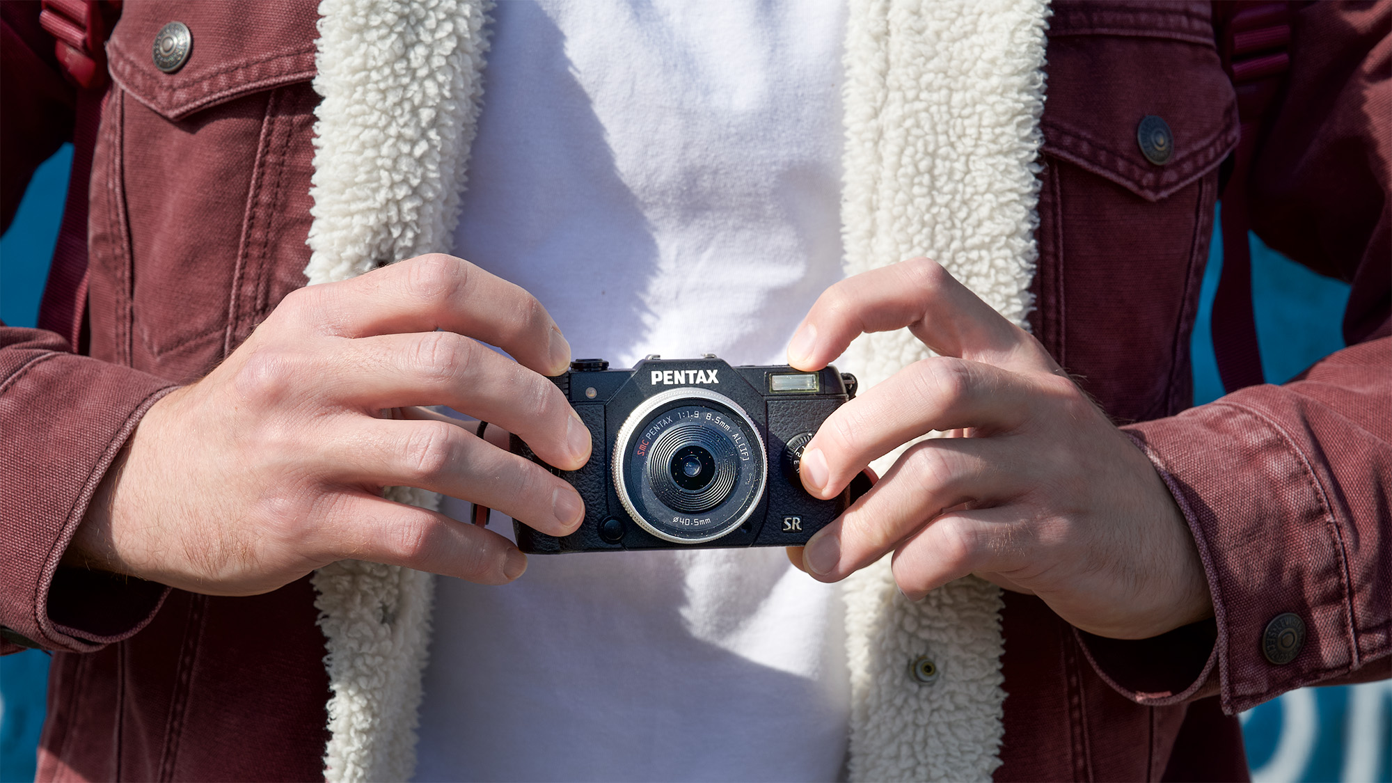 I think this mini mirrorless oddity, the Pentax Q10, is the